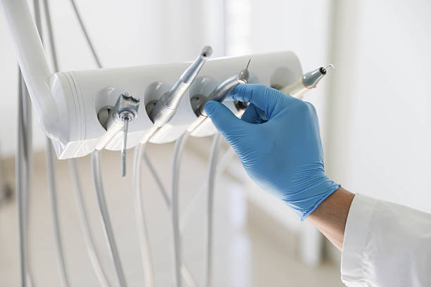 Professional Dental Implants technician working in Methuen Town, MA